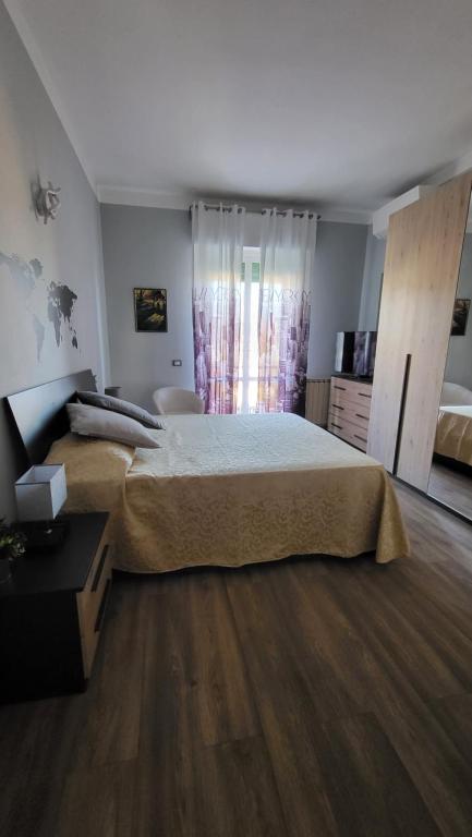 Posteľ alebo postele v izbe v ubytovaní La Casa del Buonviaggio