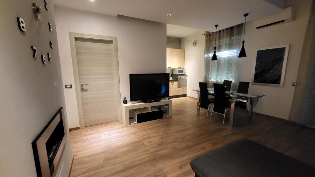 Televízia a/alebo spoločenská miestnosť v ubytovaní La Casa del Buonviaggio