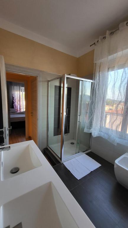 Posteľ alebo postele v izbe v ubytovaní La Casa del Buonviaggio