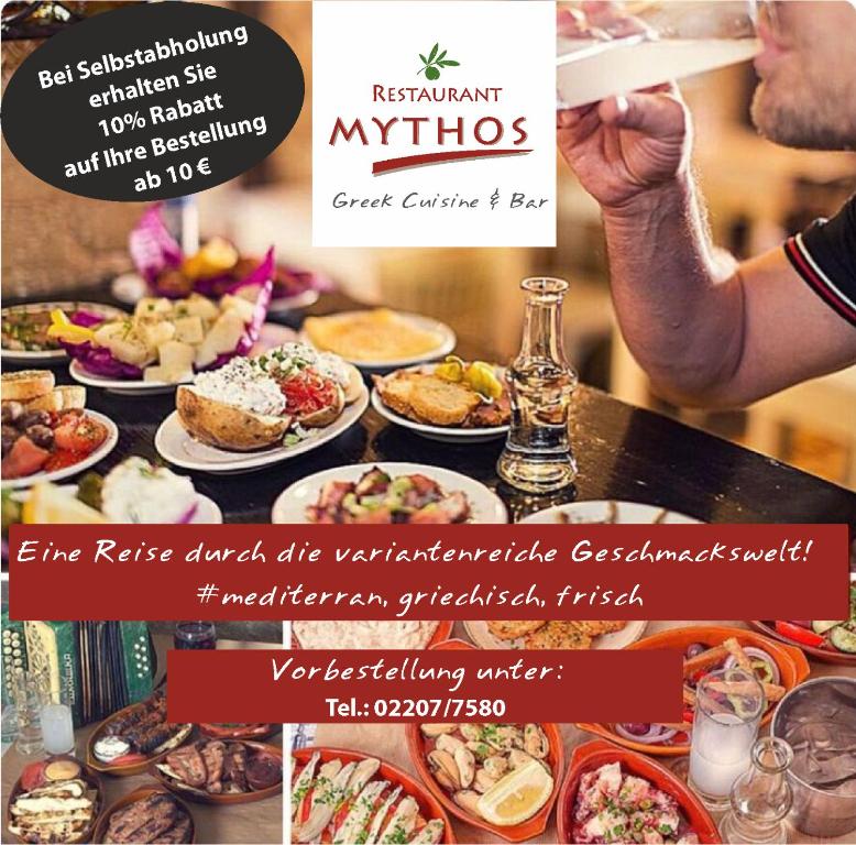 a flyer for a restaurant with a table full of food at Zur Eiche in Overath