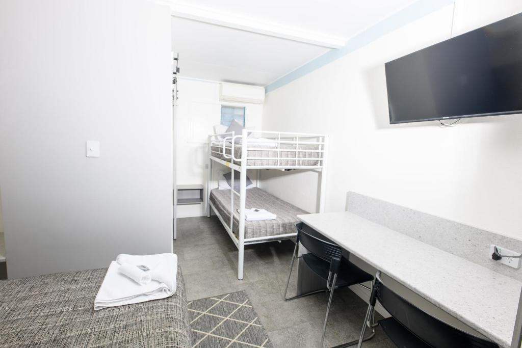 Postel nebo postele na pokoji v ubytování Y Motels Kingaroy