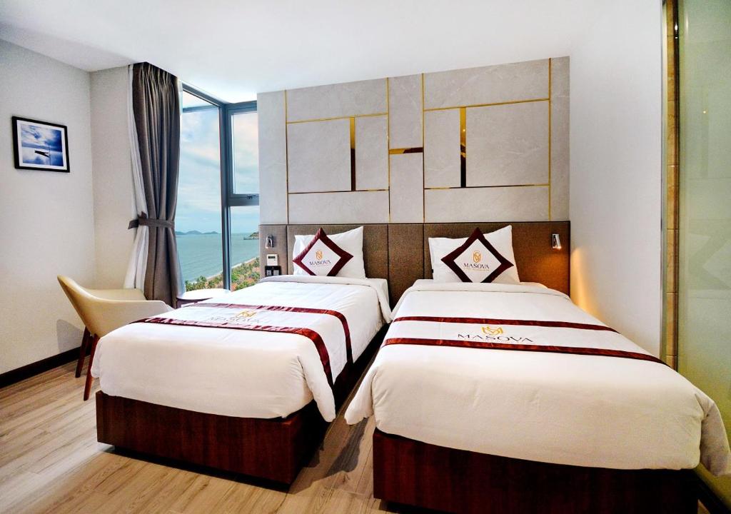 Phòng Deluxe Đôi hoặc 2 giường đơn nhìn ra 1 góc biển