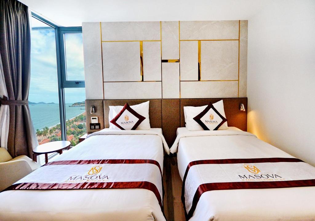 Phòng Deluxe Đôi hoặc 2 giường đơn nhìn ra 1 góc biển