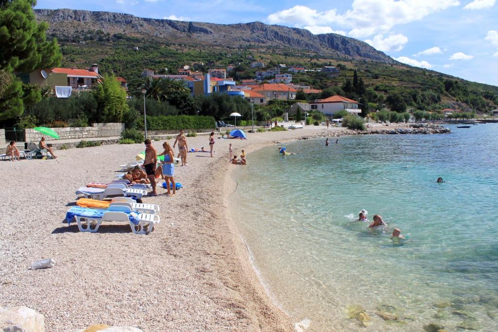 Fotografia z galérie ubytovania Seaside luxury villa with a swimming pool Podstrana, Split - 9466 v destinácii Podstrana