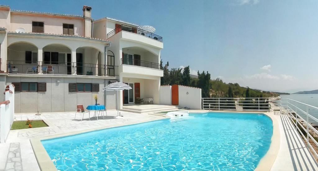 Fotografie z fotogalerie ubytování Seaside apartments with a swimming pool Seget Vranjica, Trogir - 2571 v Trogiru