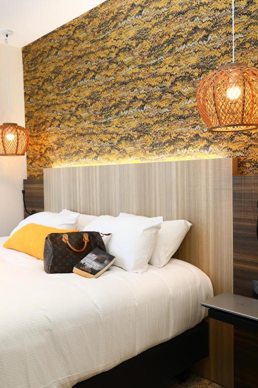 Postel nebo postele na pokoji v ubytování Best Western Mulhouse Salvator Centre
