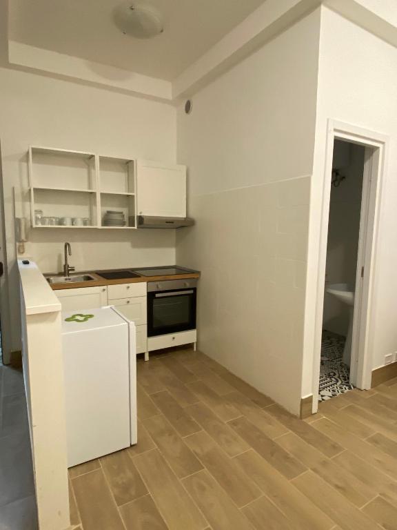 Kuchyň nebo kuchyňský kout v ubytování Art Atelier Apartments