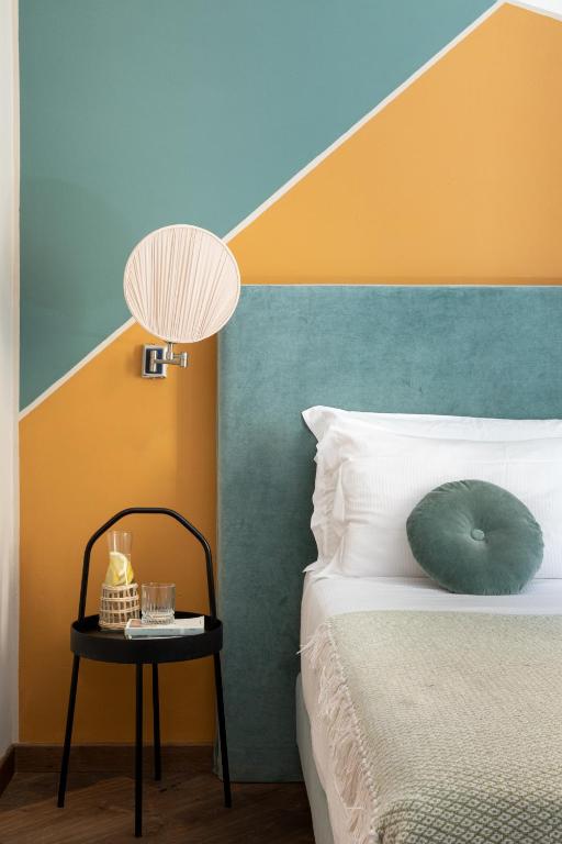 A bed or beds in a room at Boutique Hotel Galatea