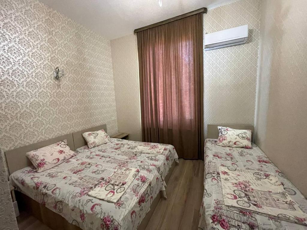 Postel nebo postele na pokoji v ubytování Hotel Alley