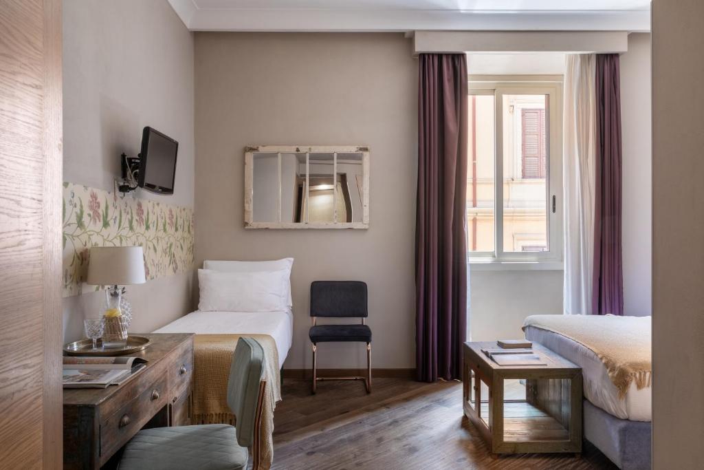 A television and/or entertainment centre at Boutique Hotel Galatea