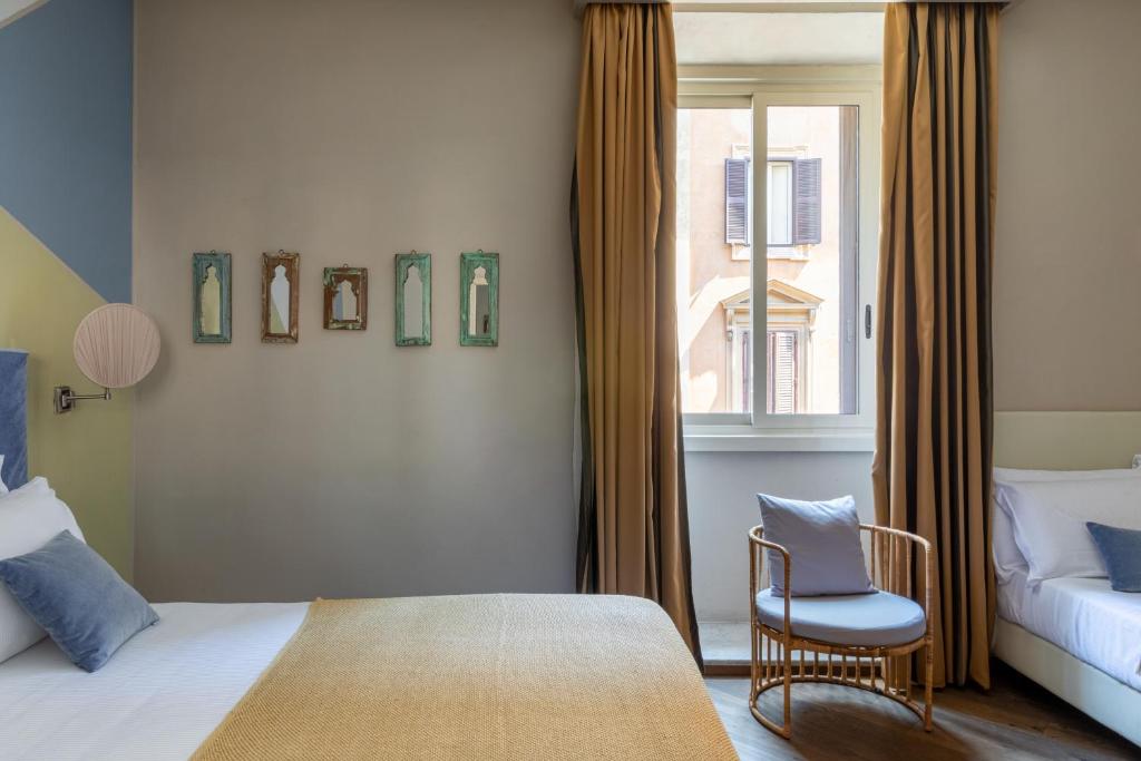 A bed or beds in a room at Boutique Hotel Galatea