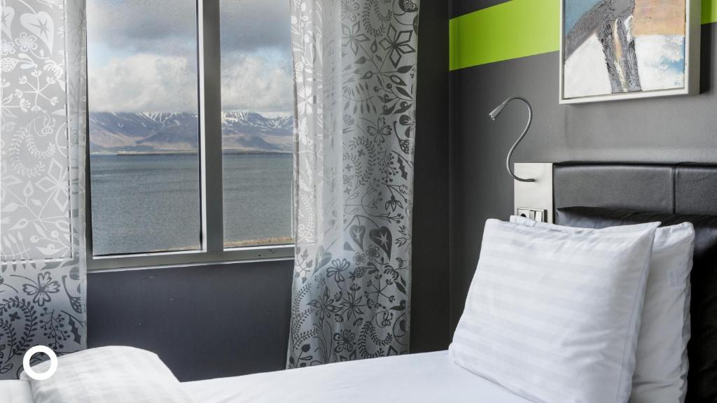 Postel nebo postele na pokoji v ubytování Center Hotels Arnarhvoll