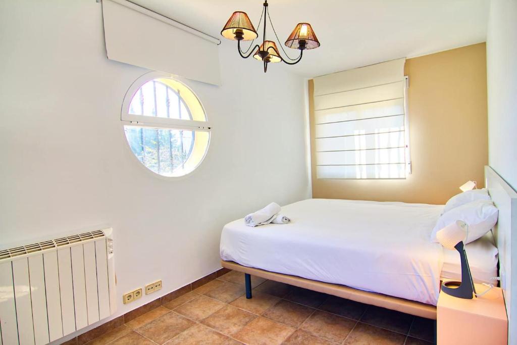 Postel nebo postele na pokoji v ubytování Villa Los Olivos