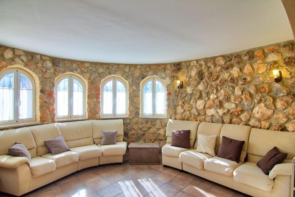 Posezení v ubytování Villa Los Olivos