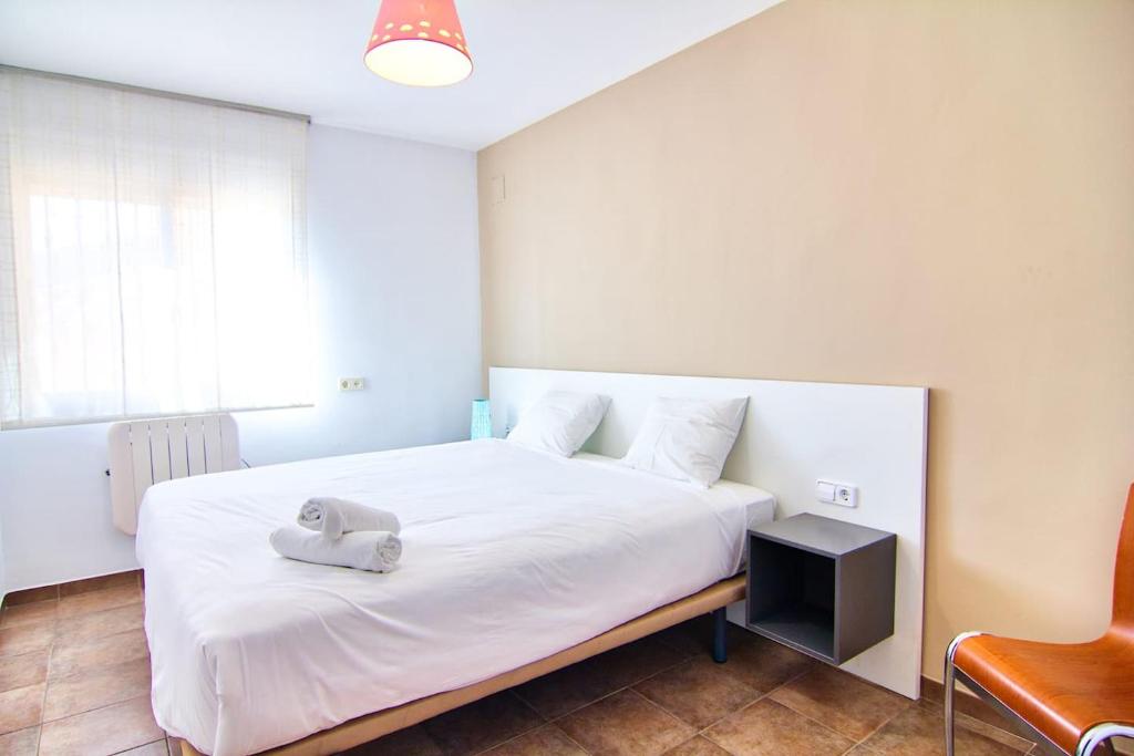 Postel nebo postele na pokoji v ubytování Villa Los Olivos