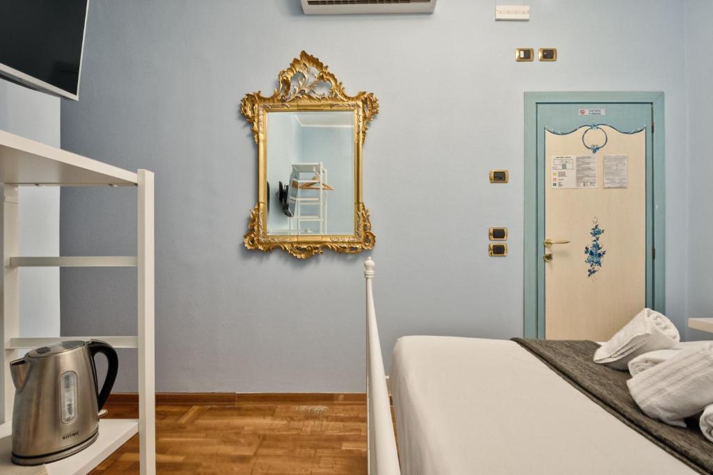 Postel nebo postele na pokoji v ubytování Piccolo Vecellio