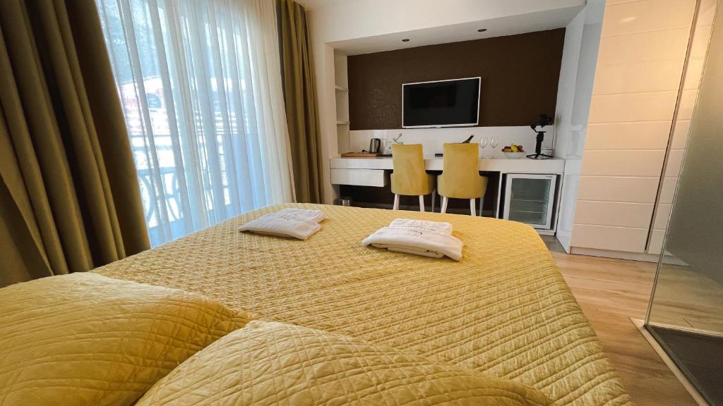 Кровать или кровати в номере Rhapsody Hotel & Spa Kalkan
