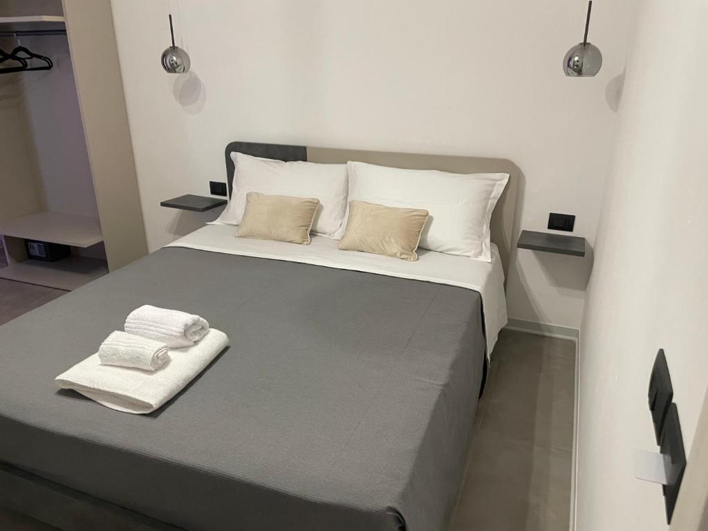Posteľ alebo postele v izbe v ubytovaní Amaranto Guesthouse