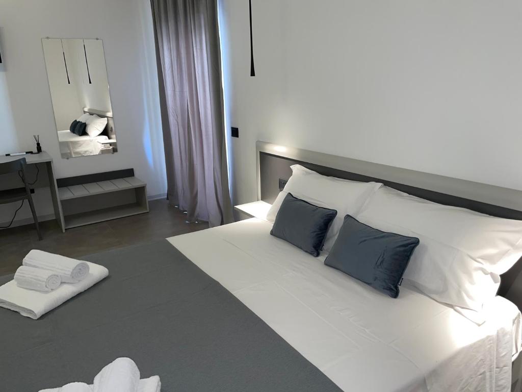 Posteľ alebo postele v izbe v ubytovaní Amaranto Guesthouse