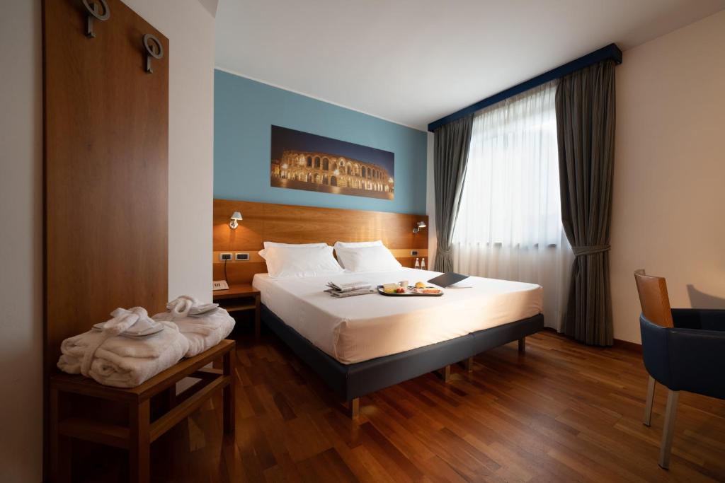 Postel nebo postele na pokoji v ubytování Best Western Hotel Fiera Verona