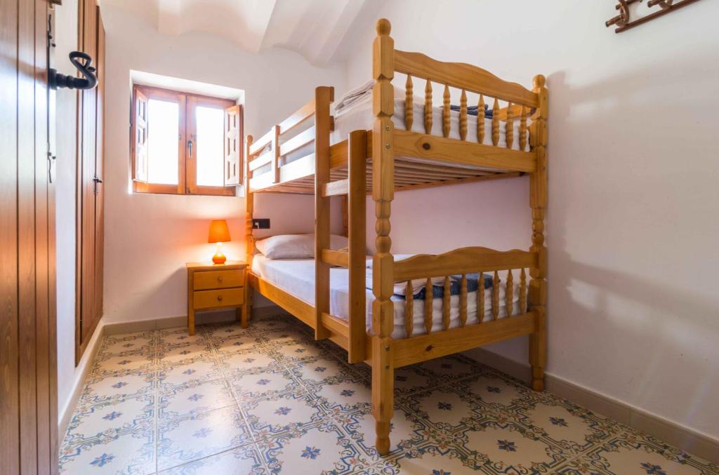 Postel nebo postele na pokoji v ubytování Finca La Celada