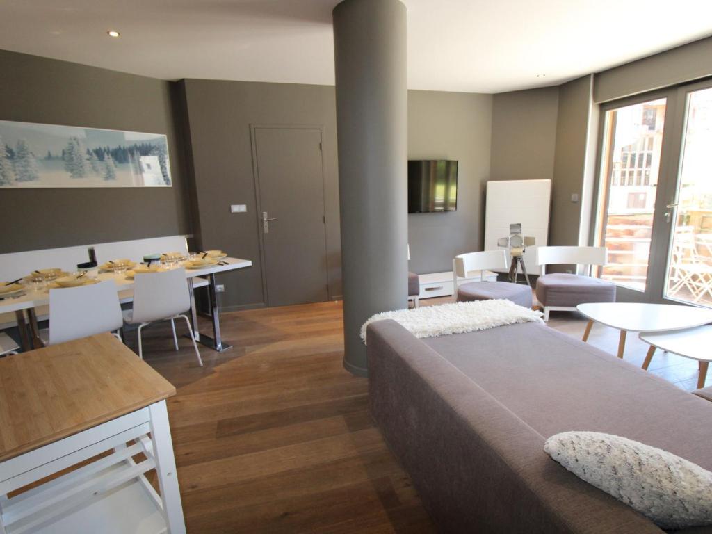 a room with a bed and a table and chairs at Appartement Avoriaz, 4 pièces, 8 personnes - FR-1-633-13 in Avoriaz