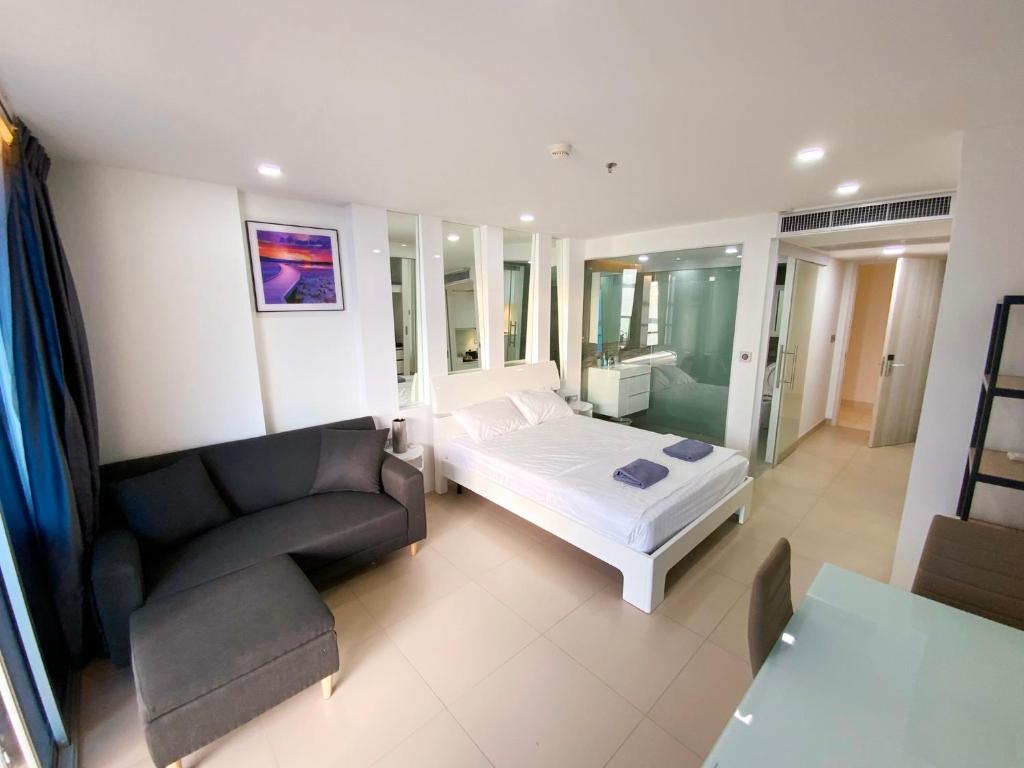 Postel nebo postele na pokoji v ubytování Sands Condo 48 by ThaiminatorPattaya