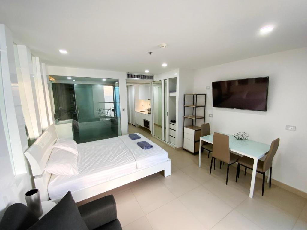 Postel nebo postele na pokoji v ubytování Sands Condo 48 by ThaiminatorPattaya