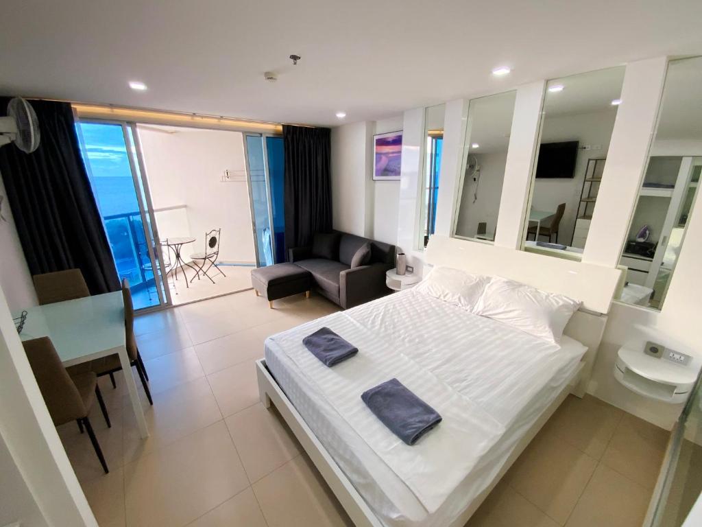 Postel nebo postele na pokoji v ubytování Sands Condo 48 by ThaiminatorPattaya