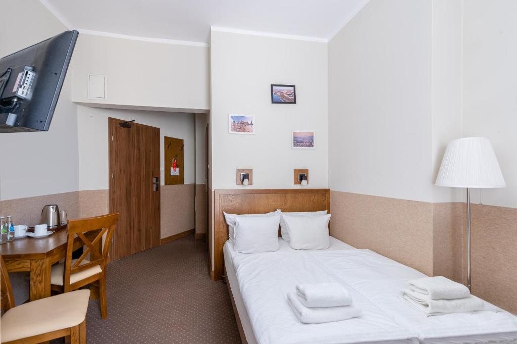 Posteľ alebo postele v izbe v ubytovaní Daniel Griffin Aparthotel by Artery Hotels