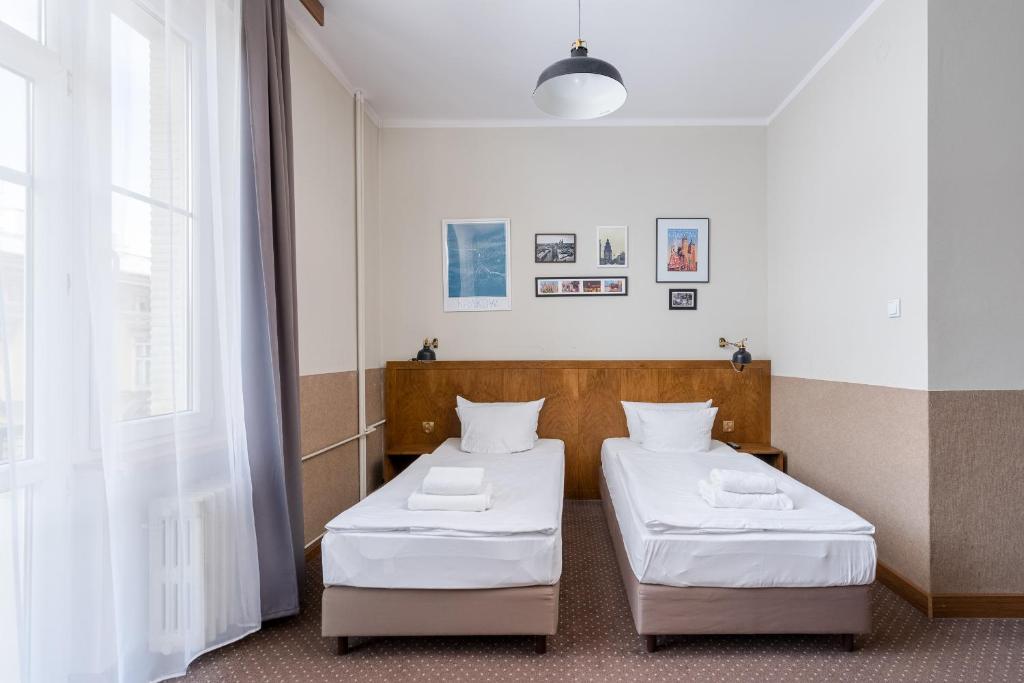Posteľ alebo postele v izbe v ubytovaní Daniel Griffin Aparthotel by Artery Hotels