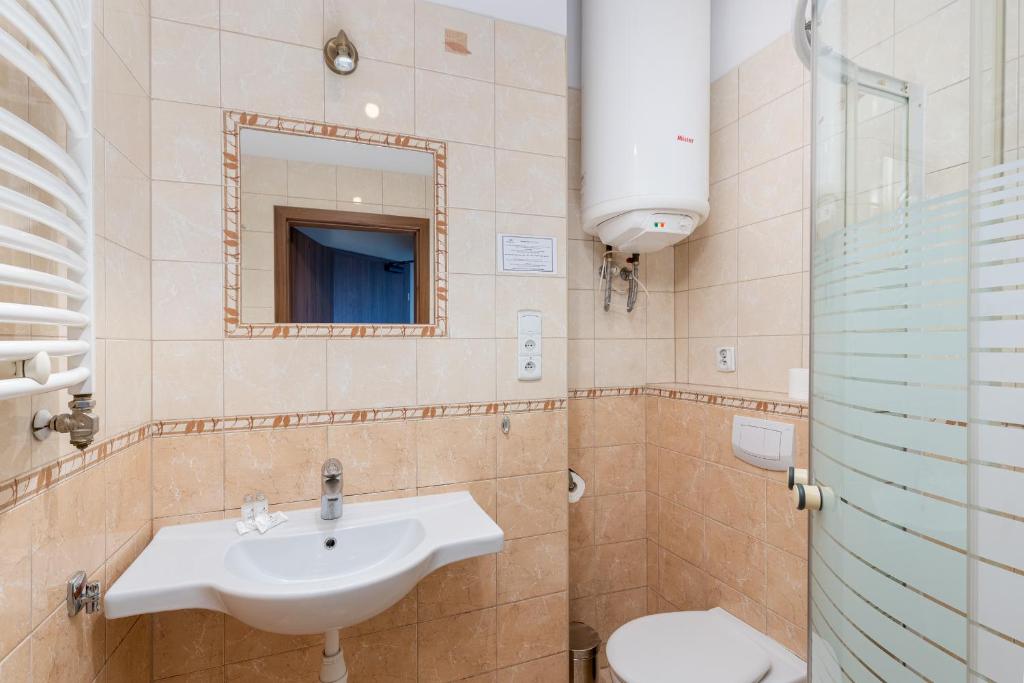 Kúpeľňa v ubytovaní Daniel Griffin Aparthotel by Artery Hotels