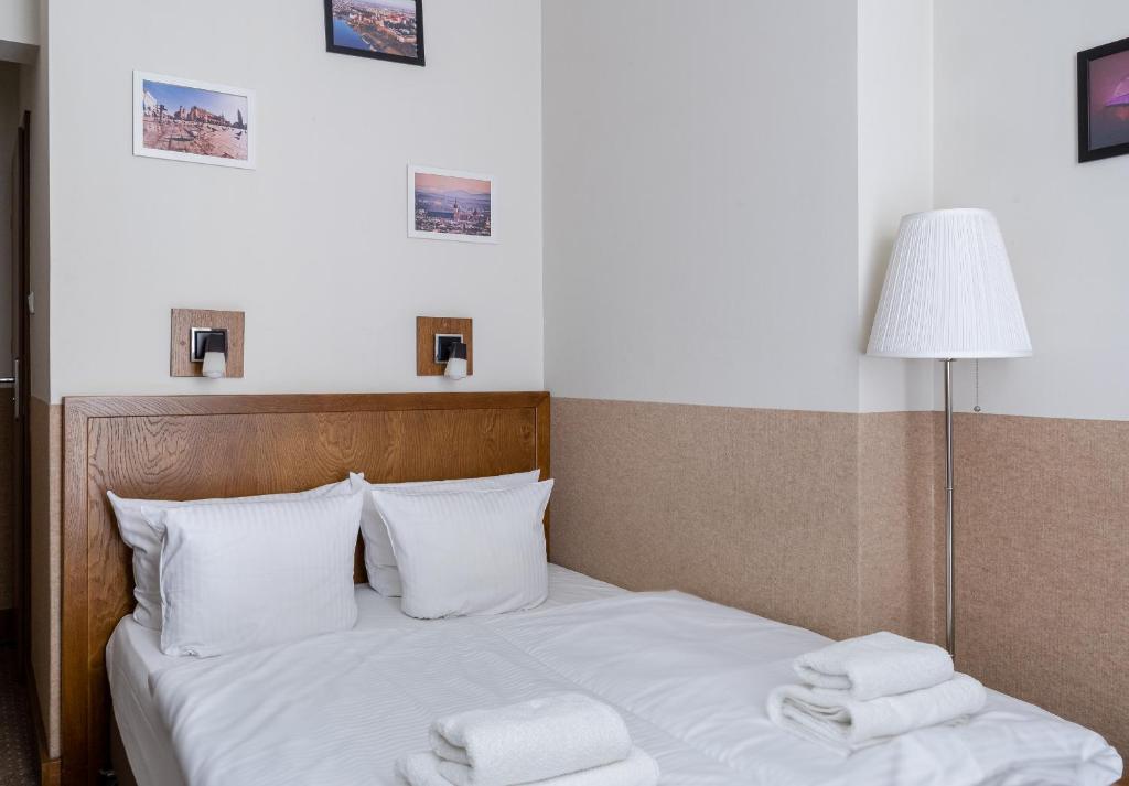 Posteľ alebo postele v izbe v ubytovaní Daniel Griffin Aparthotel by Artery Hotels