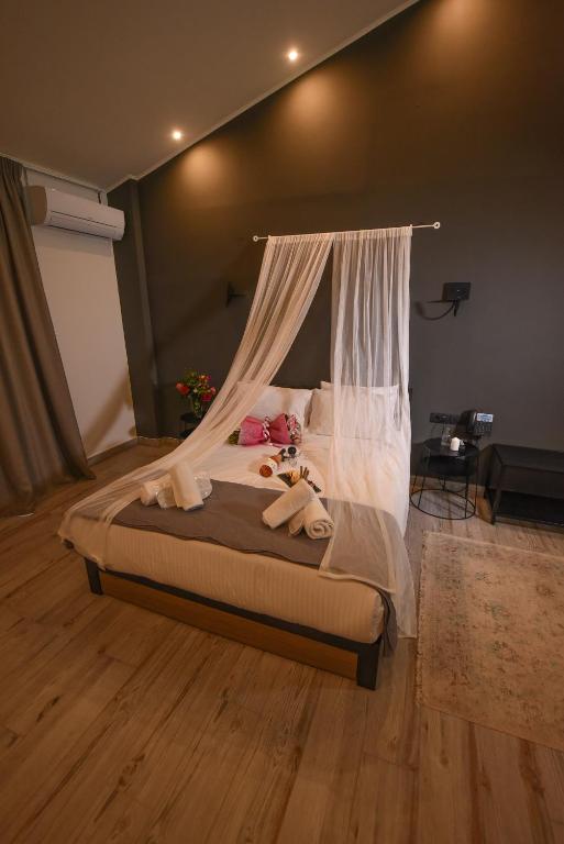 Postel nebo postele na pokoji v ubytování Hotel Koferita