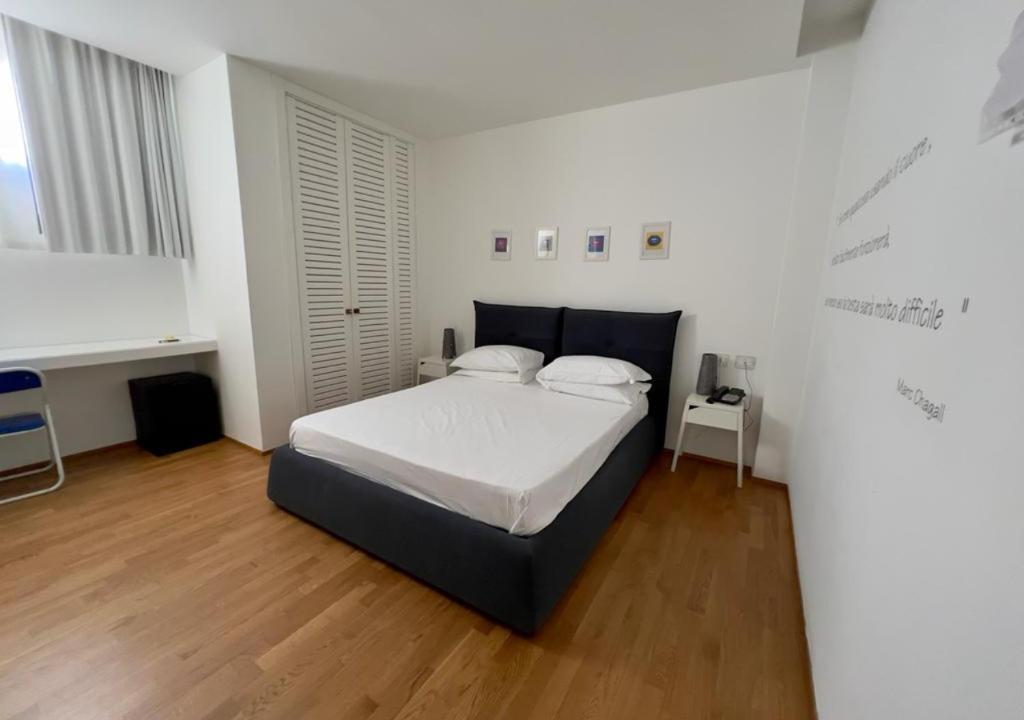 Postel nebo postele na pokoji v ubytování Copacabana Hotel Design