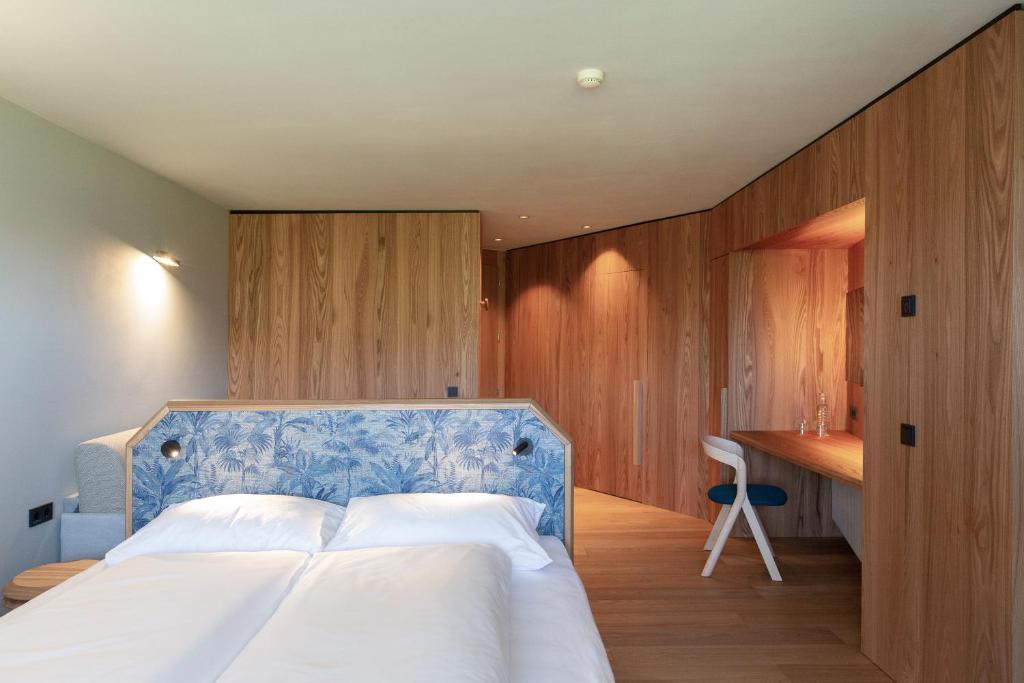 Postel nebo postele na pokoji v ubytování ICARO Hotel