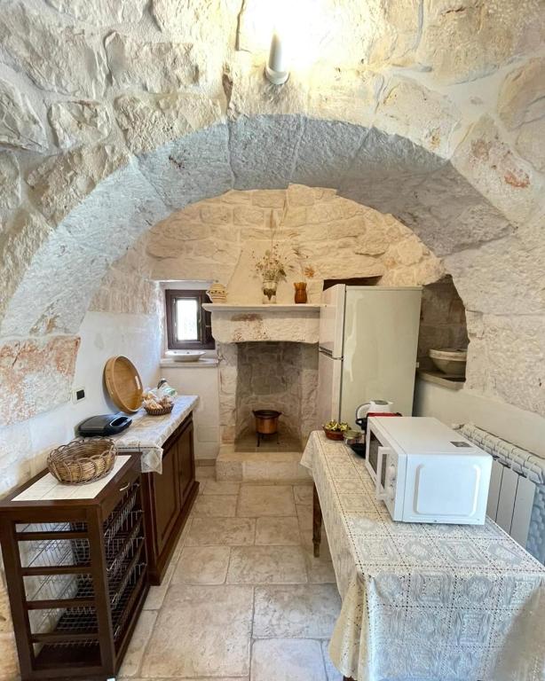 Kuchnia lub aneks kuchenny w obiekcie Trulli Demetra