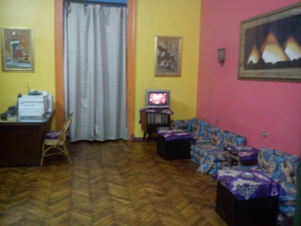 TV a/nebo společenská místnost v ubytování African House Hostel