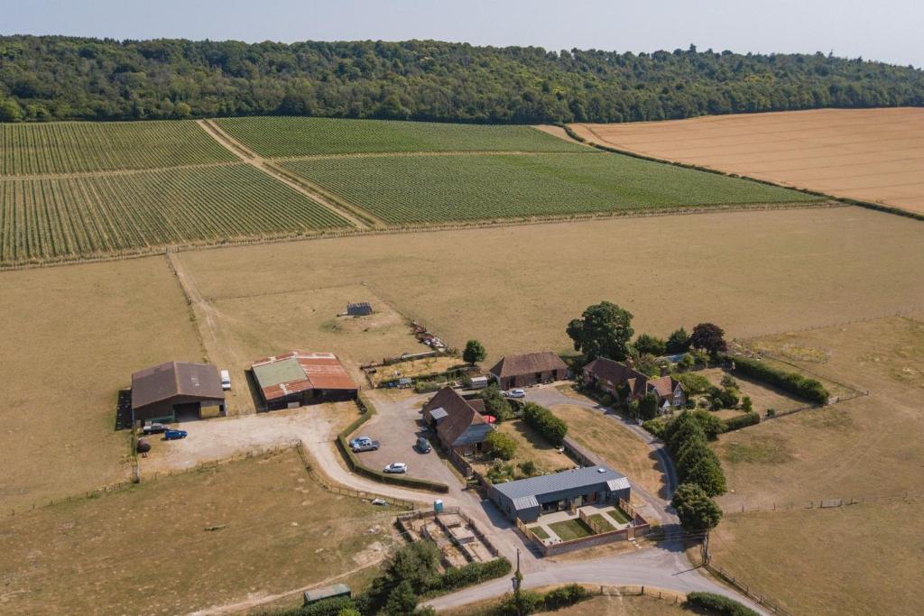 an aerial view of a farm and a field at The Bull Pen by Bloom Stays in Stalisfield