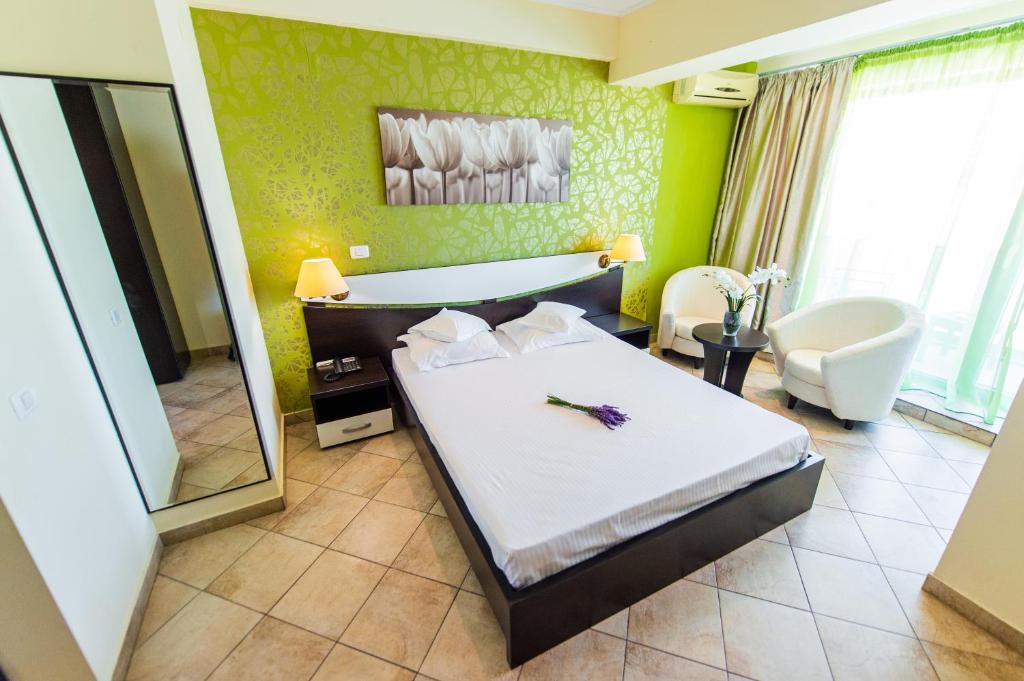 Postel nebo postele na pokoji v ubytování Hotel Prestige