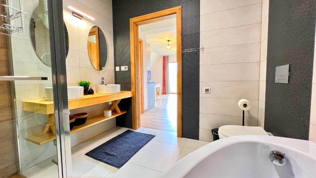 Kúpeľňa v ubytovaní Apartamenty Widok Tatr
