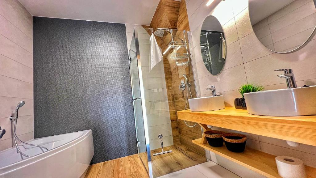 Kúpeľňa v ubytovaní Apartamenty Widok Tatr