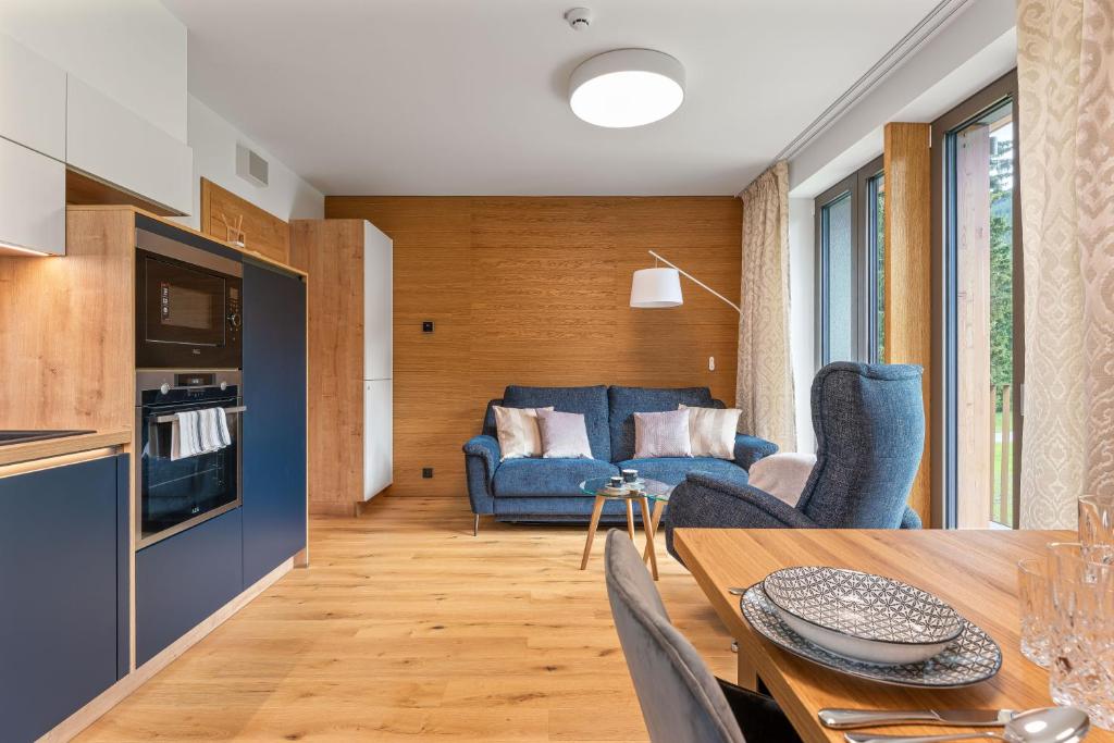 Kuchyň nebo kuchyňský kout v ubytování Residence Koubek - Útulný apartmán s výhledem a parkováním