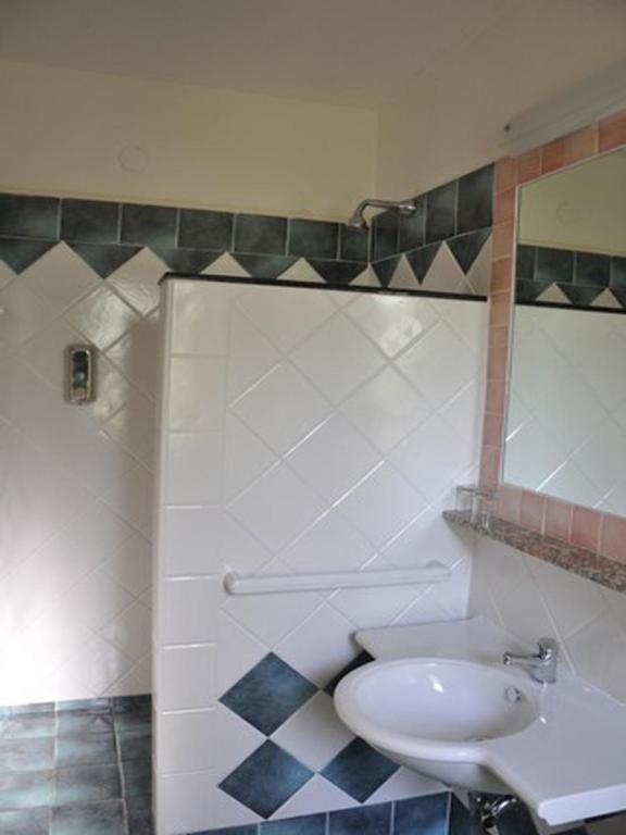 Koupelna v ubytování Hotel L'Oasi