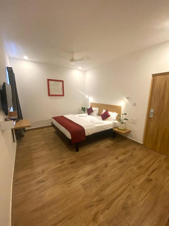 Postel nebo postele na pokoji v ubytování Hotel Bluestone