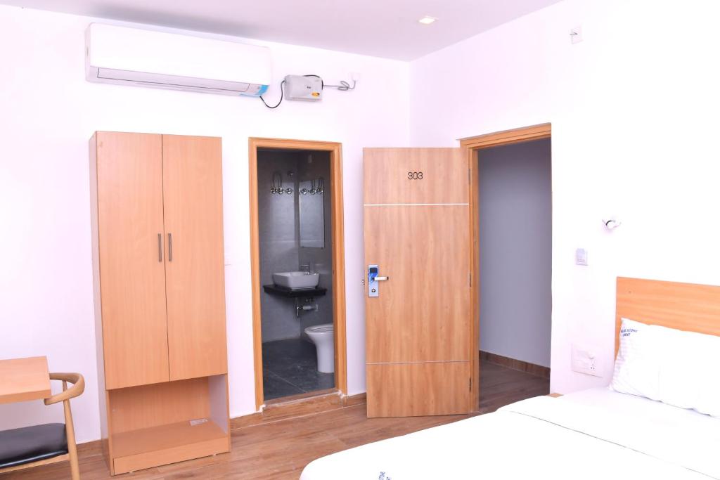 Postel nebo postele na pokoji v ubytování Hotel Bluestone
