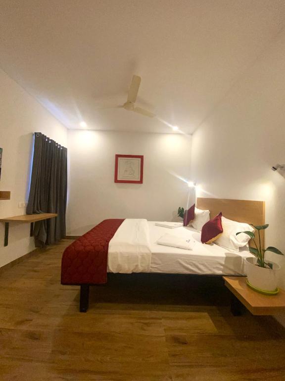 Postel nebo postele na pokoji v ubytování Hotel Bluestone