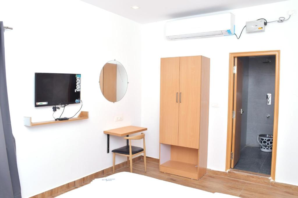TV a/nebo společenská místnost v ubytování Hotel Bluestone