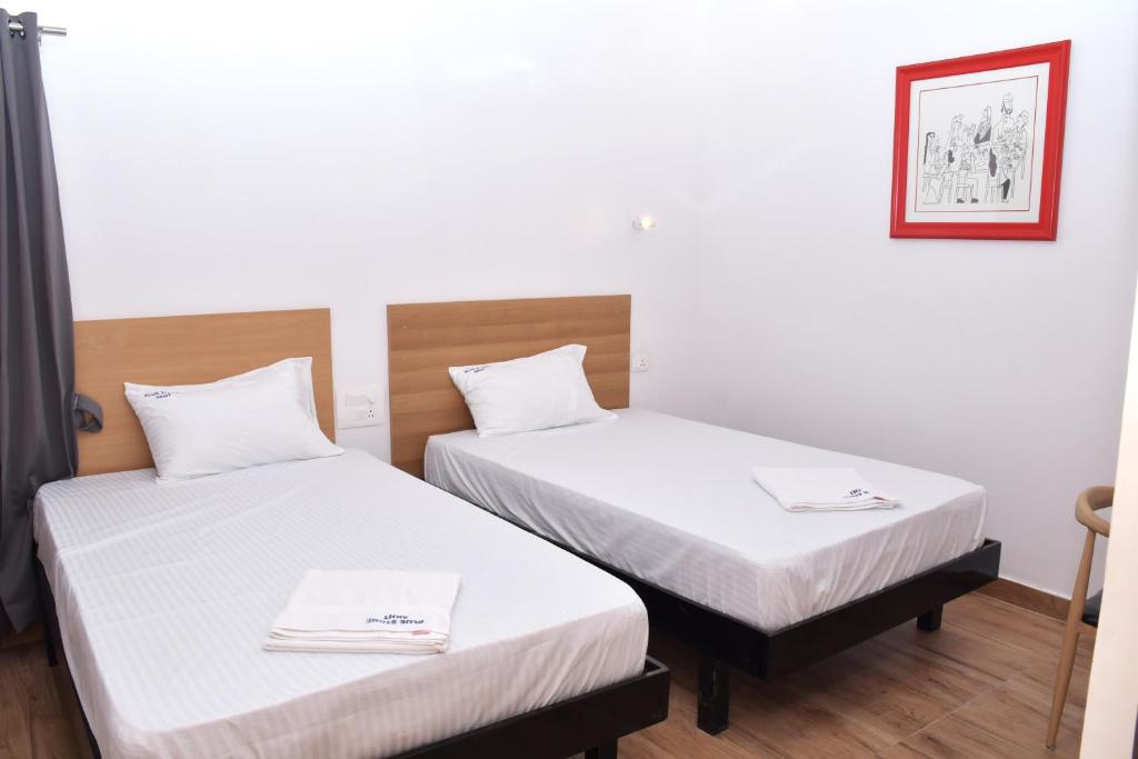 Postel nebo postele na pokoji v ubytování Hotel Bluestone