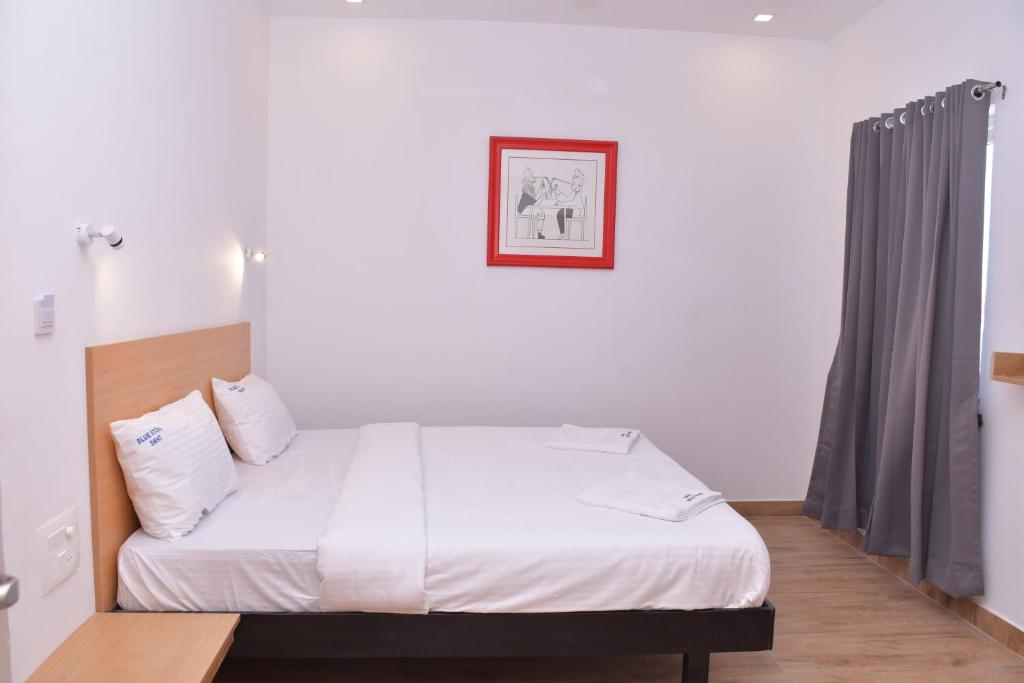 Postel nebo postele na pokoji v ubytování Hotel Bluestone